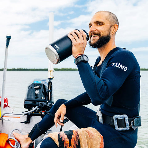 YETI Rambler 64 oz bottle, triple haul handle, easy carrying on long trips.