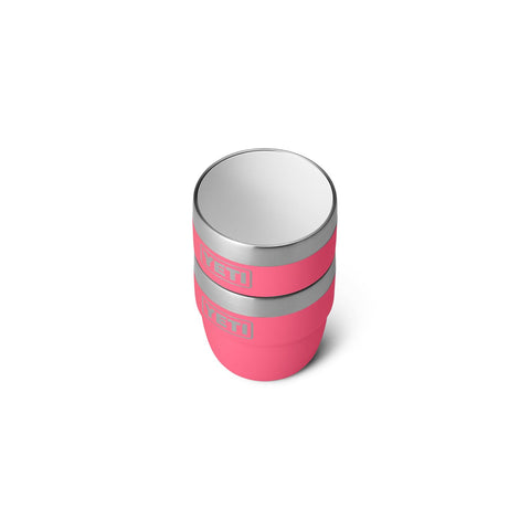 Tropical pink Rambler in travel setup for on-the-go coffee.