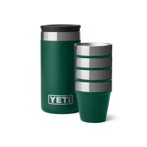 YETI shot glasses with carrying case in black forest green, four-pack, travel-ready.