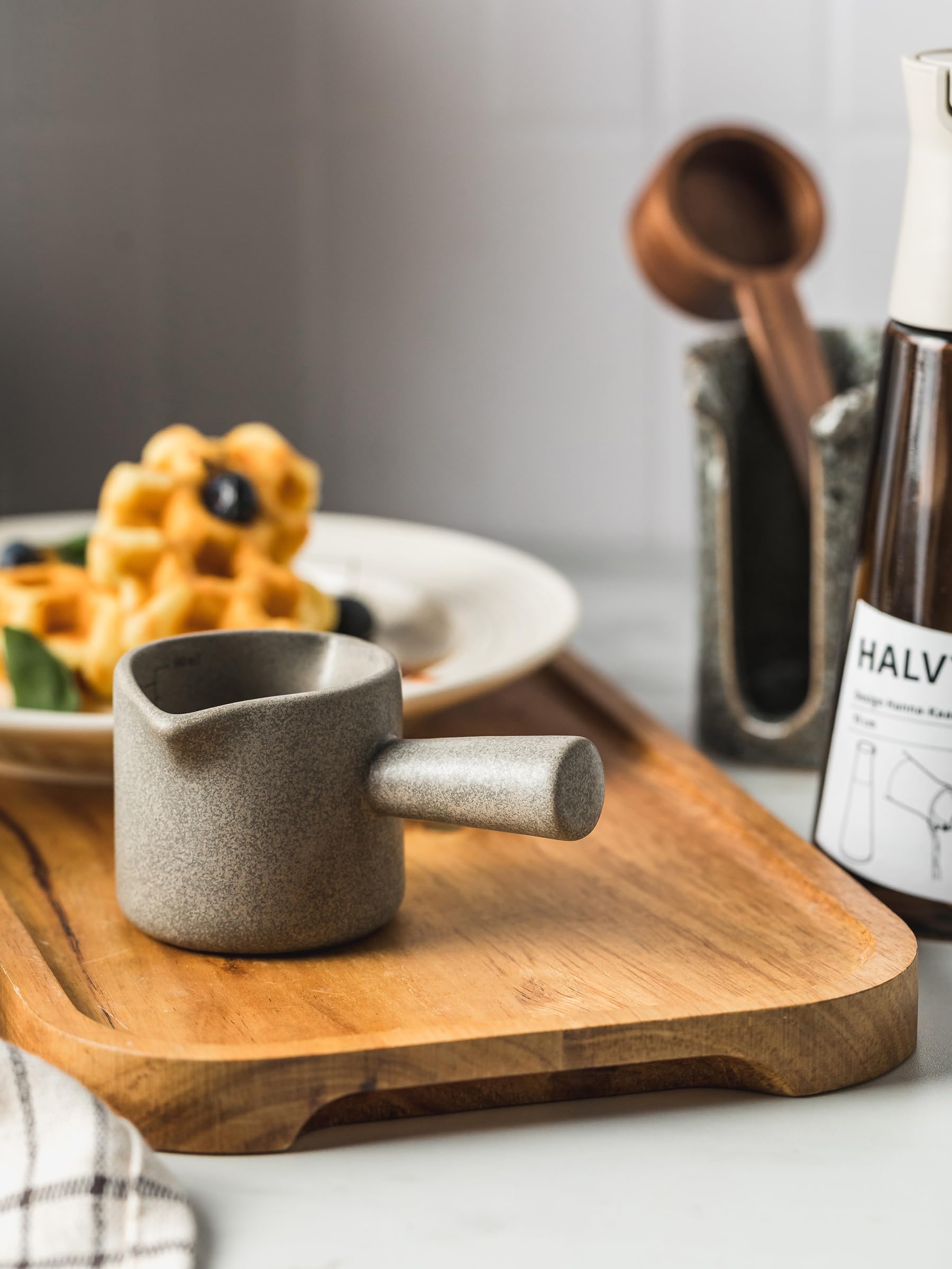 YHOJOY 3oz measuring cup suitable for small kitchen tasks.