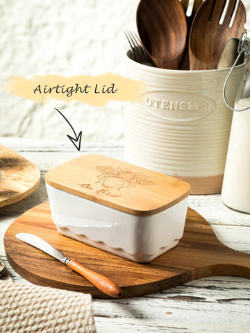 YHOJOY butter dish shows size with two sticks of butter.