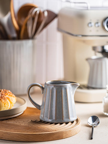 Rustic rim accent on the YHOJOY gray ceramic creamer pitcher.