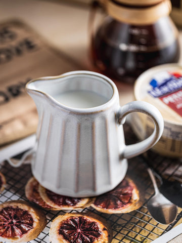 YHOJOY ceramic creamer pitcher microwave and dishwasher safe for simple cleanup.