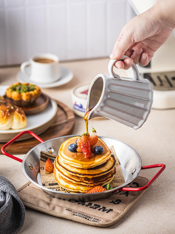 YHOJOY striped ceramic creamer pitcher with rustic rim enhances cozy kitchen moments.