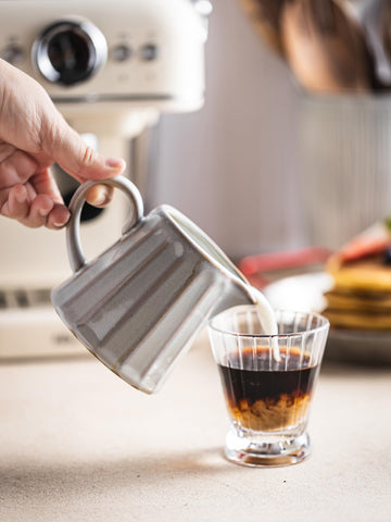 YHOJOY ceramic creamer pitcher striped design adds rustic charm to table settings.