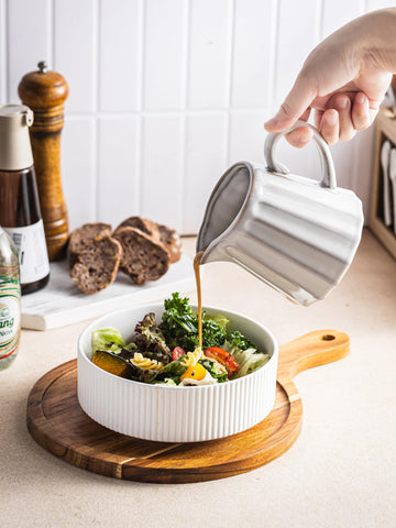 YHOJOY creamer pitcher sits on a table setting for everyday meals