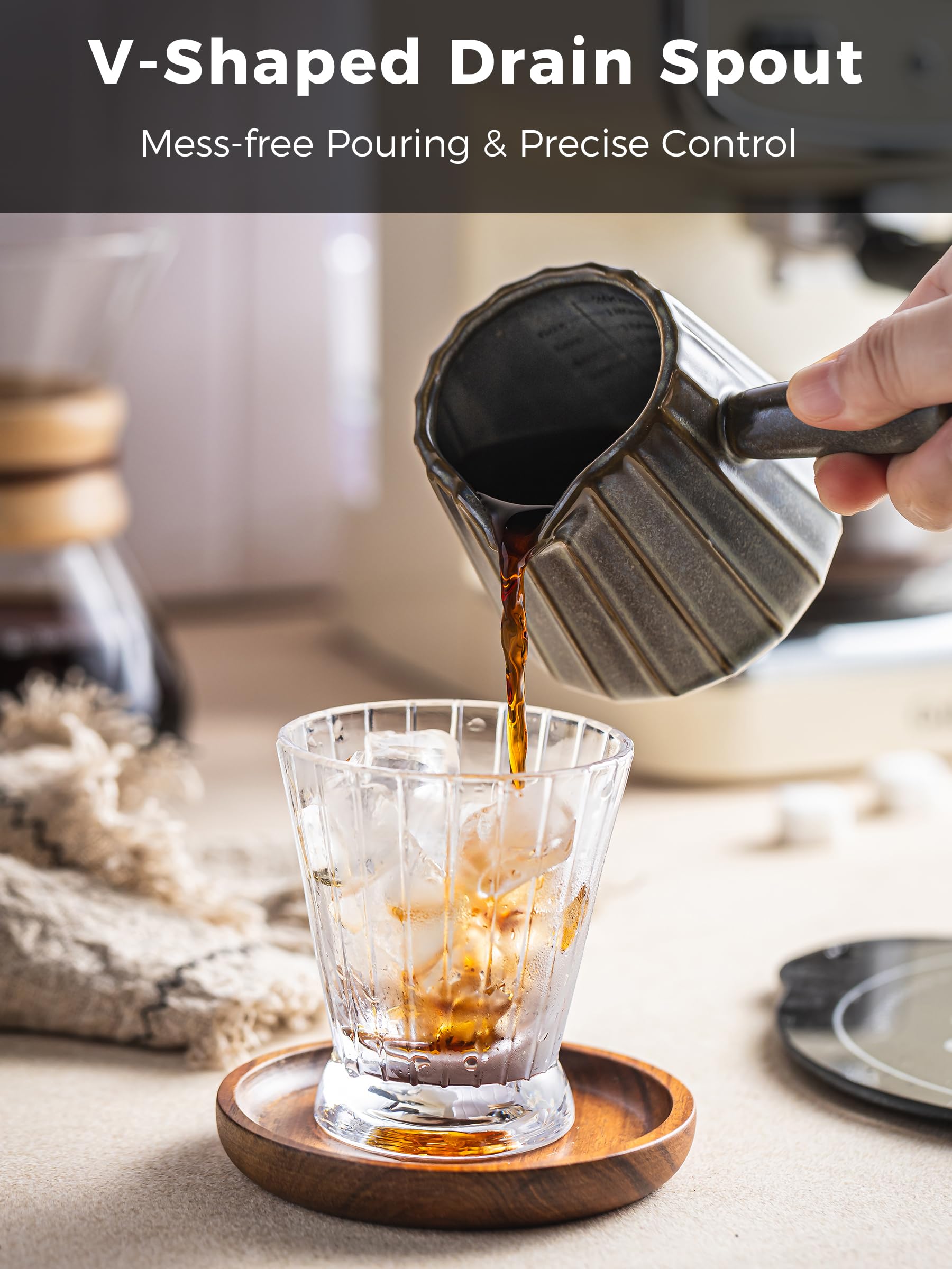 YHOJOY cup demonstrates smooth pour for frothing milk or sauces.