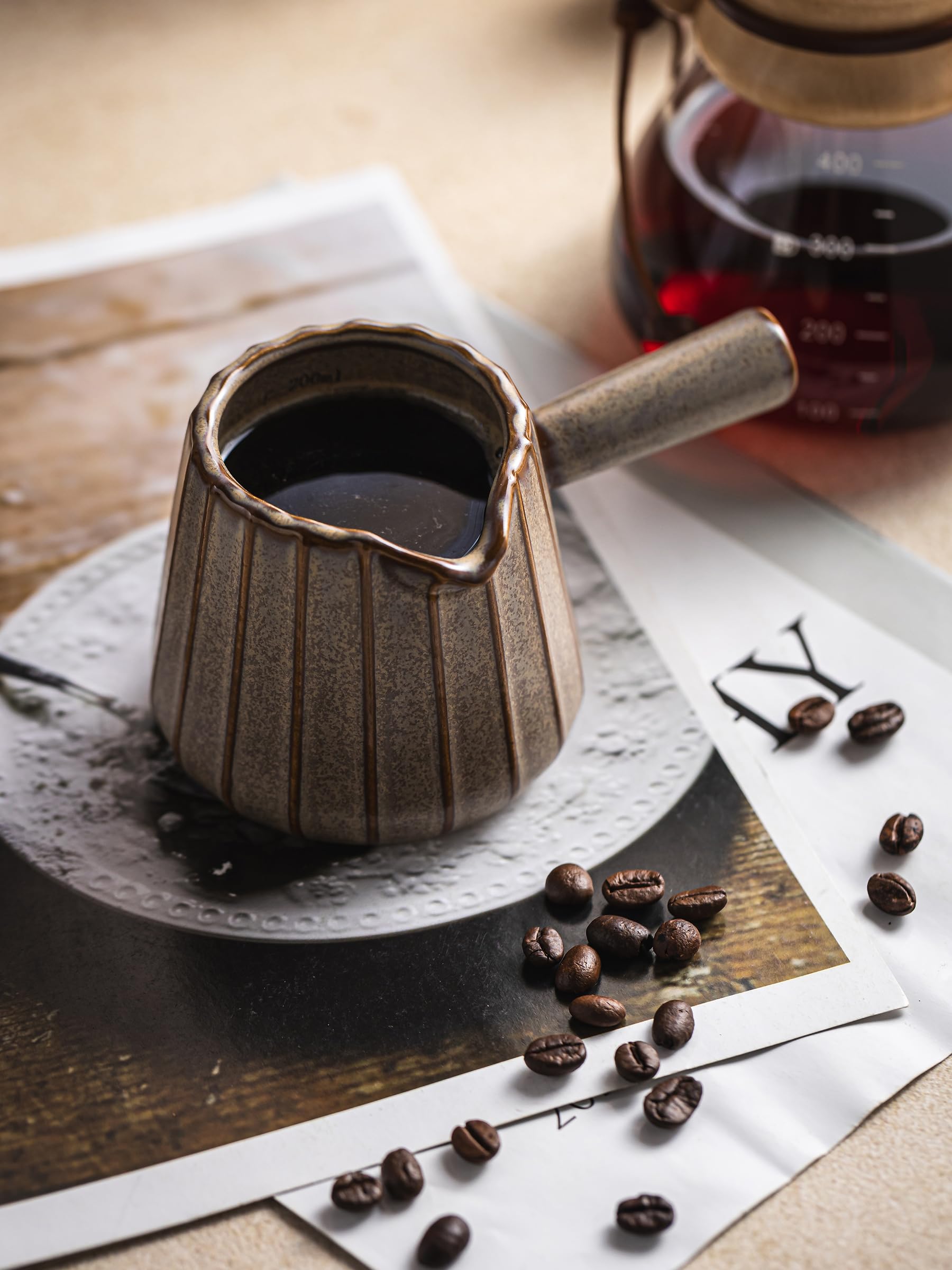 YHOJOY espresso cup showing dual measurement scales for accuracy