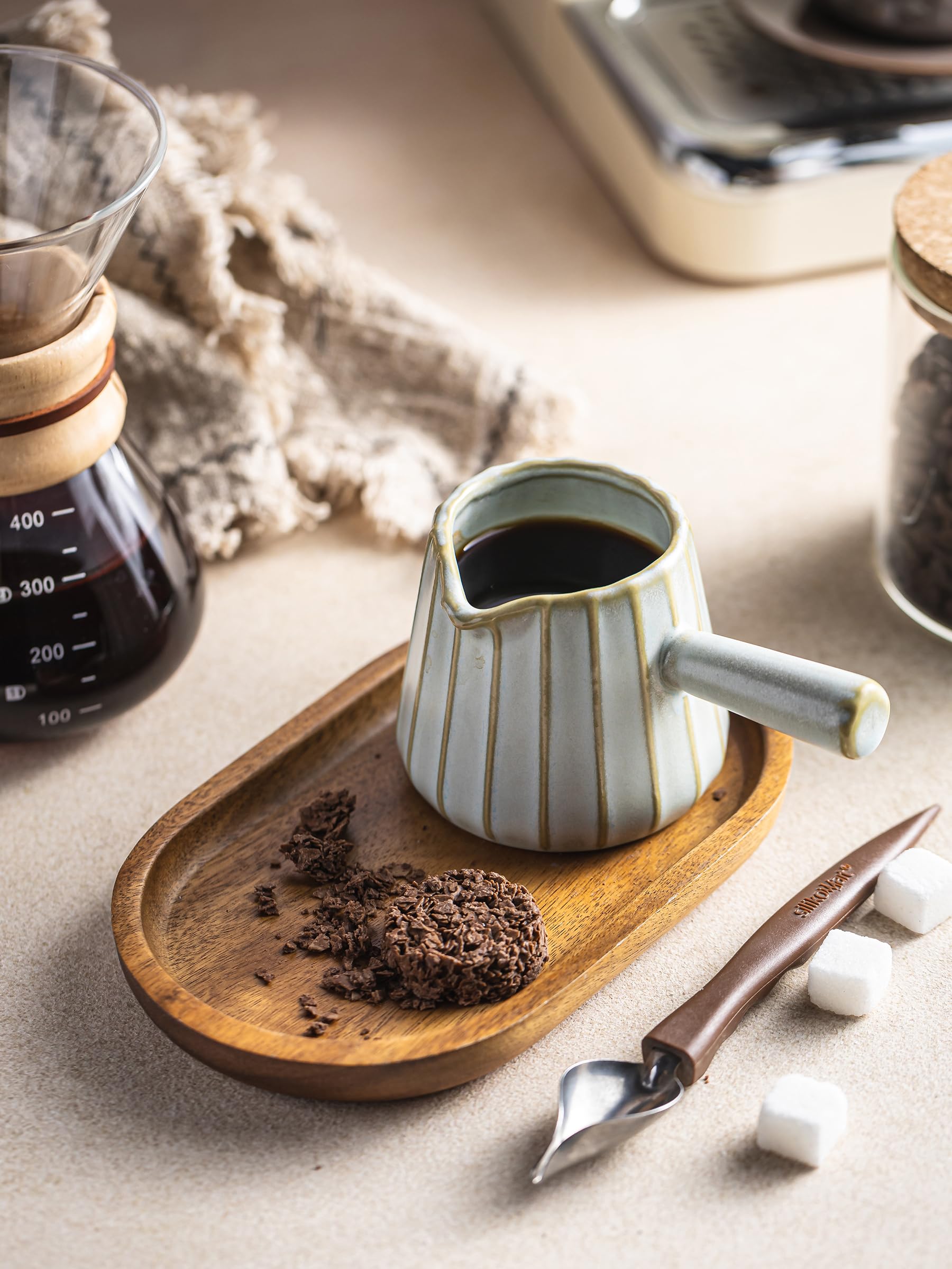 YHOJOY versatile cup suited for coffee, sauces, and dressings in kitchen