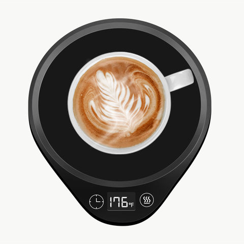 Yidirhk coffee mug warmer on a desk keeps beverages warm with fast heating
