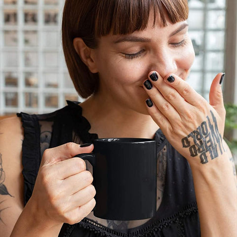 Front view of the Have a Nice Day mug, bold black ceramic design