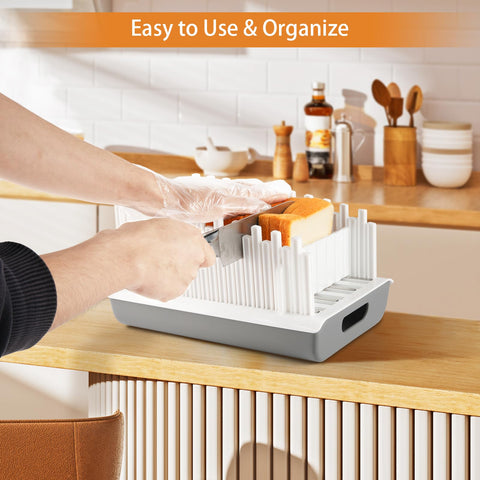 Piano-key rails on the YONGAIJIA slicer guiding the knife for even slices