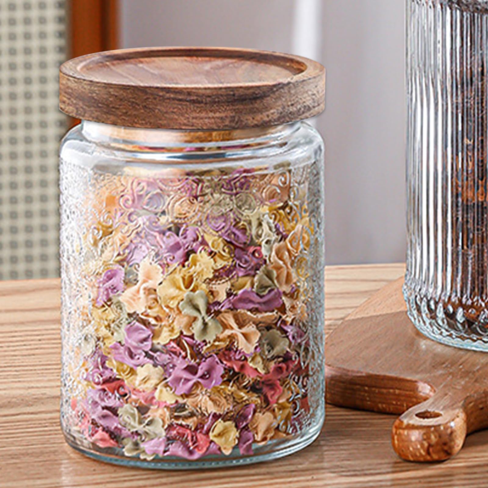 Yoqelt carved-flowers jar with wood lid ideal for cookies and snacks.