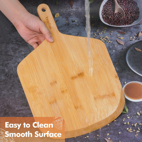 Yroshm bamboo pizza peel on oven stone ready to slide.