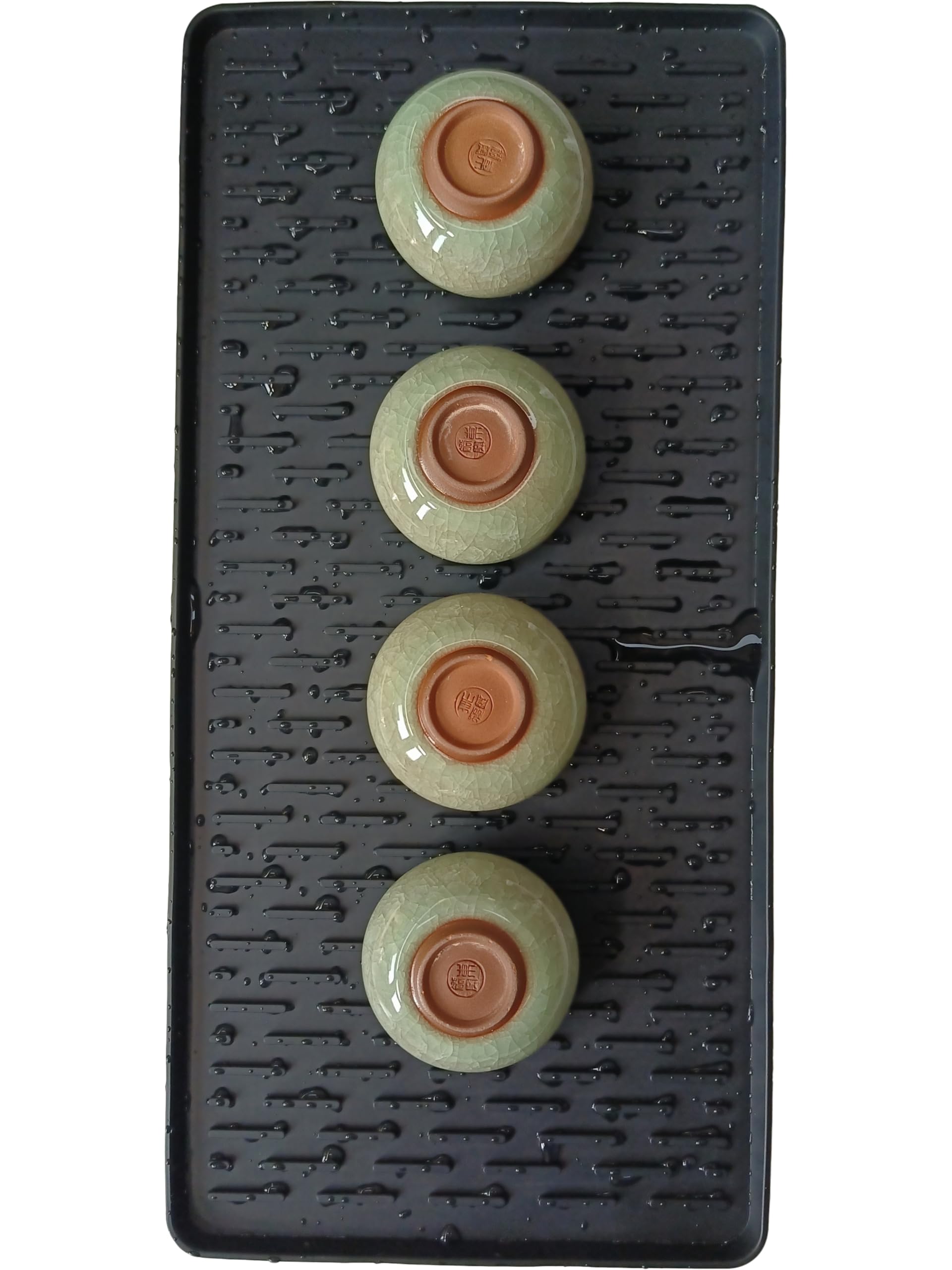 Yudevey silicone coffee mat helps organize a busy coffee station.