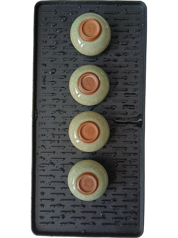 Yudevey silicone coffee mat helps organize a busy coffee station.