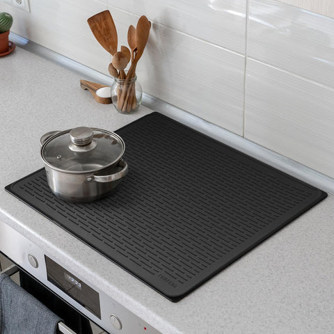 YUHFERA glass top cover drying mat with raised ridges improves air flow.