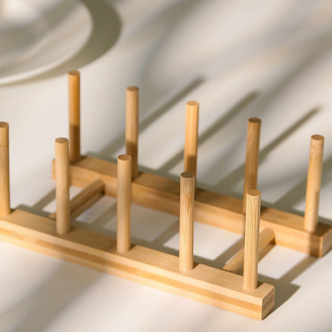 Yuixoseu bamboo dish rack used for cups, lids, and small bowls.