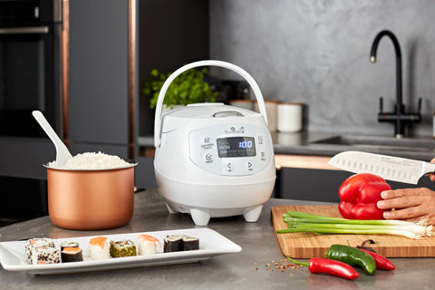 Steaming basket in use with Yum Asia Panda Mini Rice Cooker for healthy meals