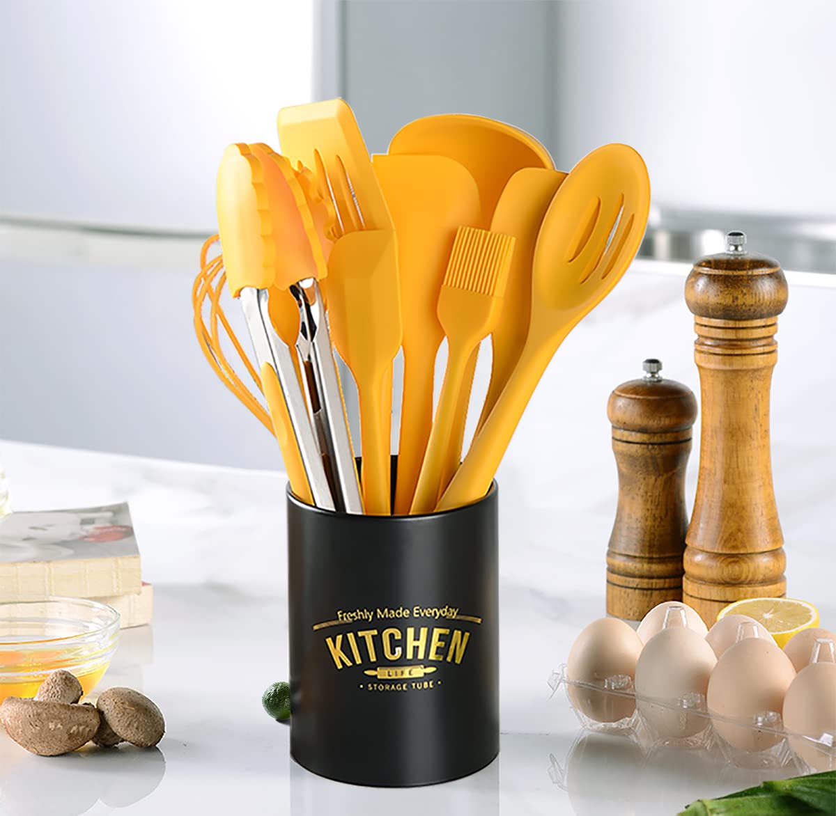 YunWuCloud silicone whisk in yellow, comfortable grip for smooth mixing.