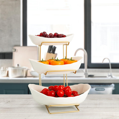 YYW display of fruits, nuts, and desserts on a countertop fruit rack