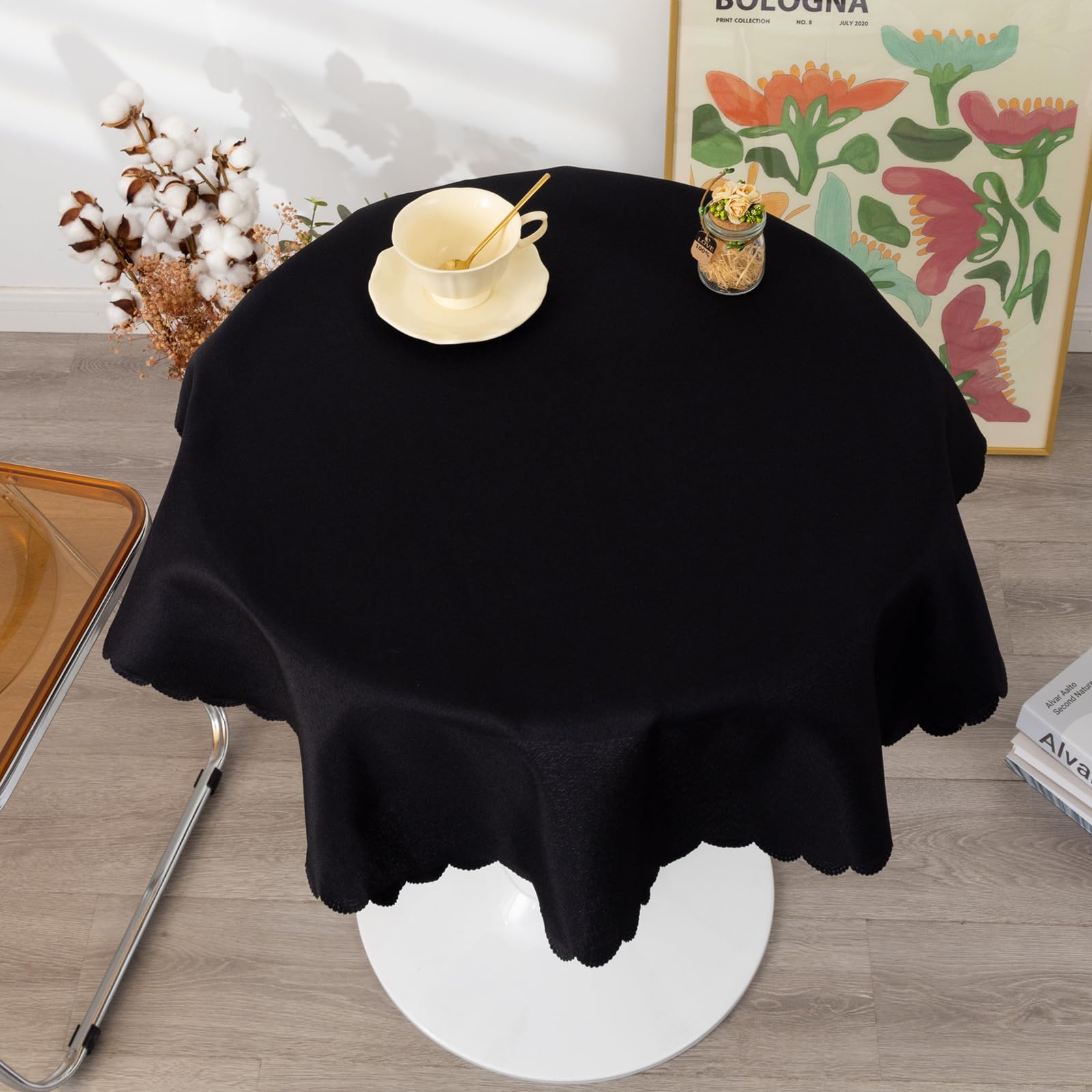 YZKITM embossed-edge round tablecloth adds subtle elegance to any table.