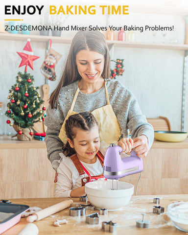 Z-DESDEMONA hand mixer with beaters attached demonstrates versatile blending for batters.