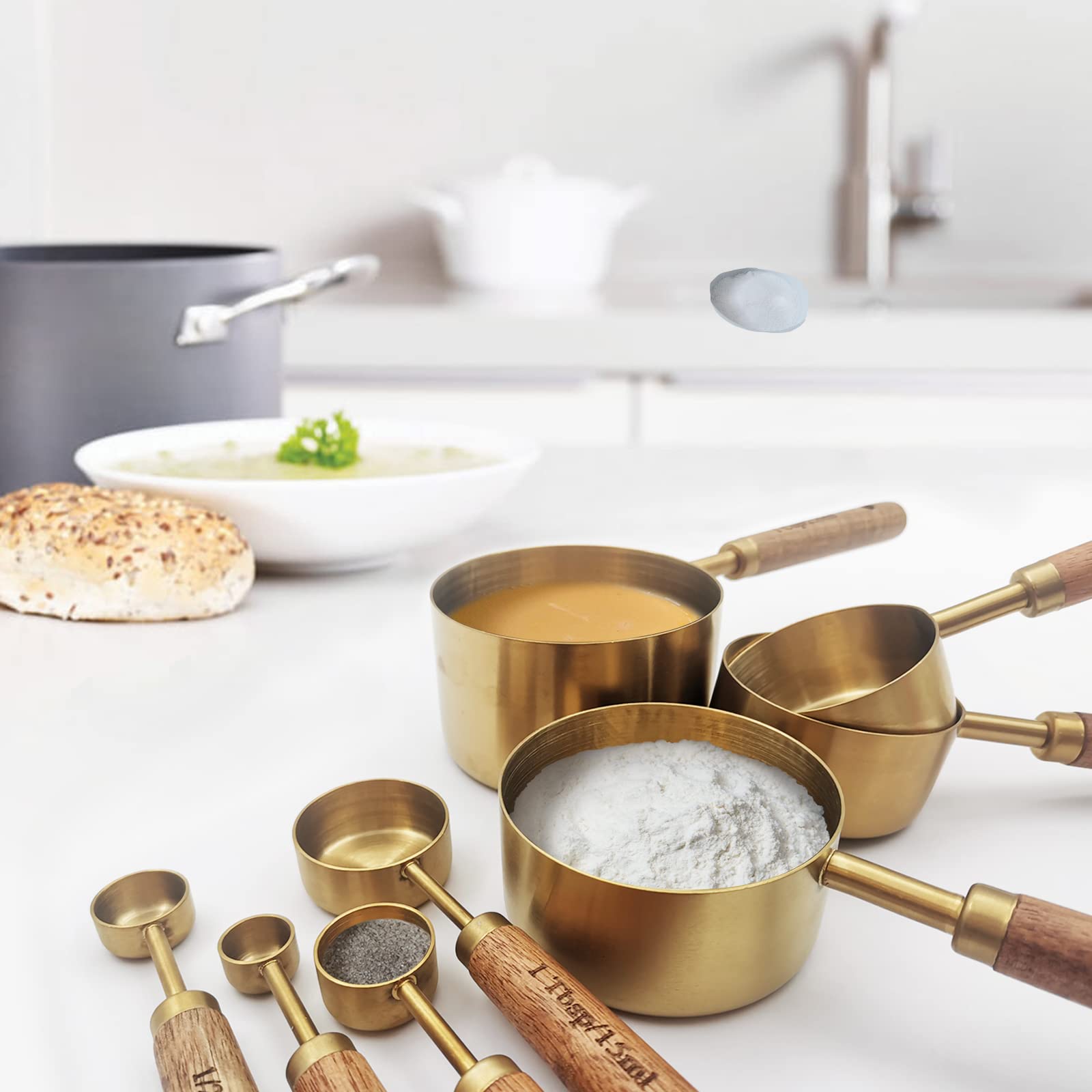 Zalaxt gold measuring spoons close-up highlighting durable metal and wooden handle