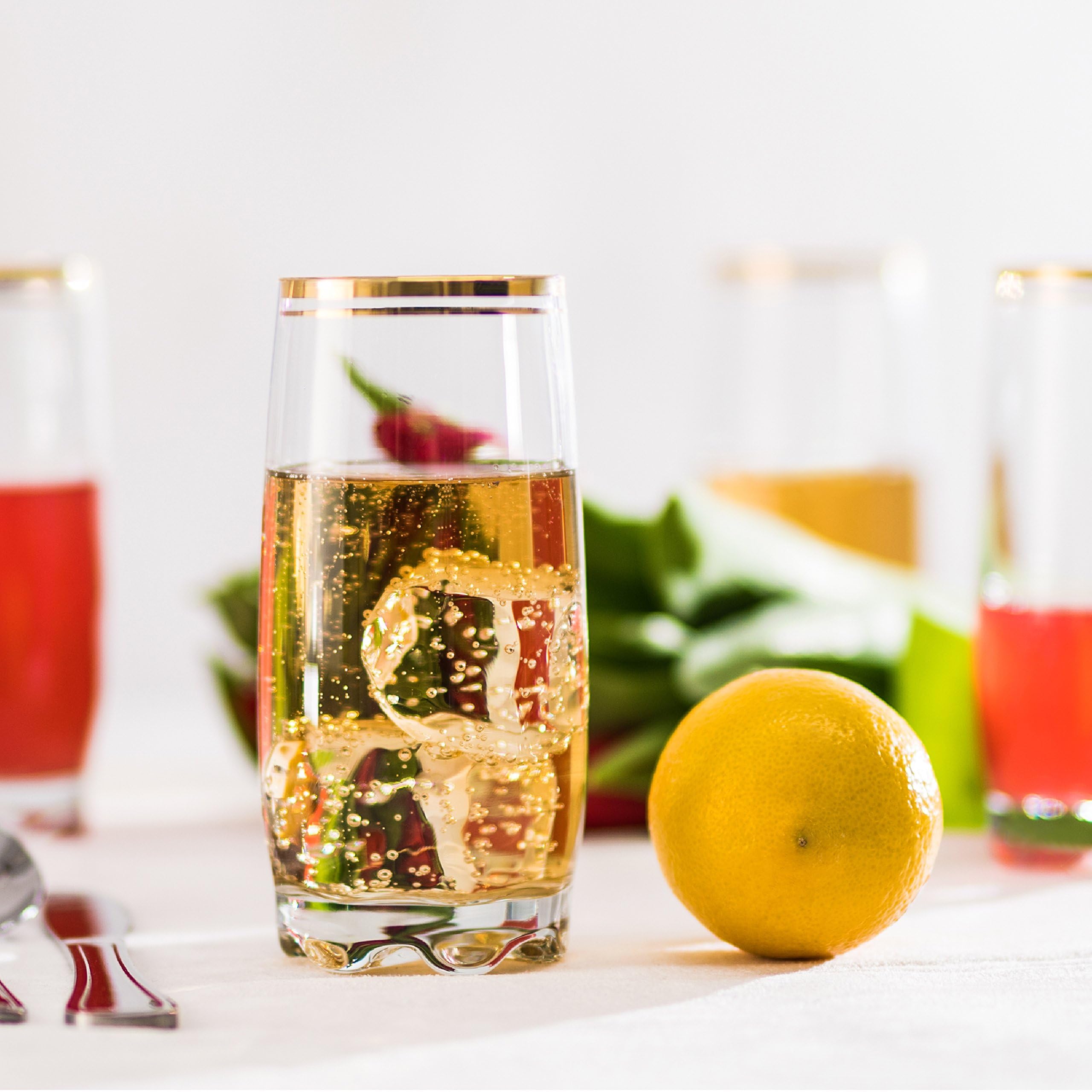 Zanzer gold glass cup set on a table for cohesive hosting