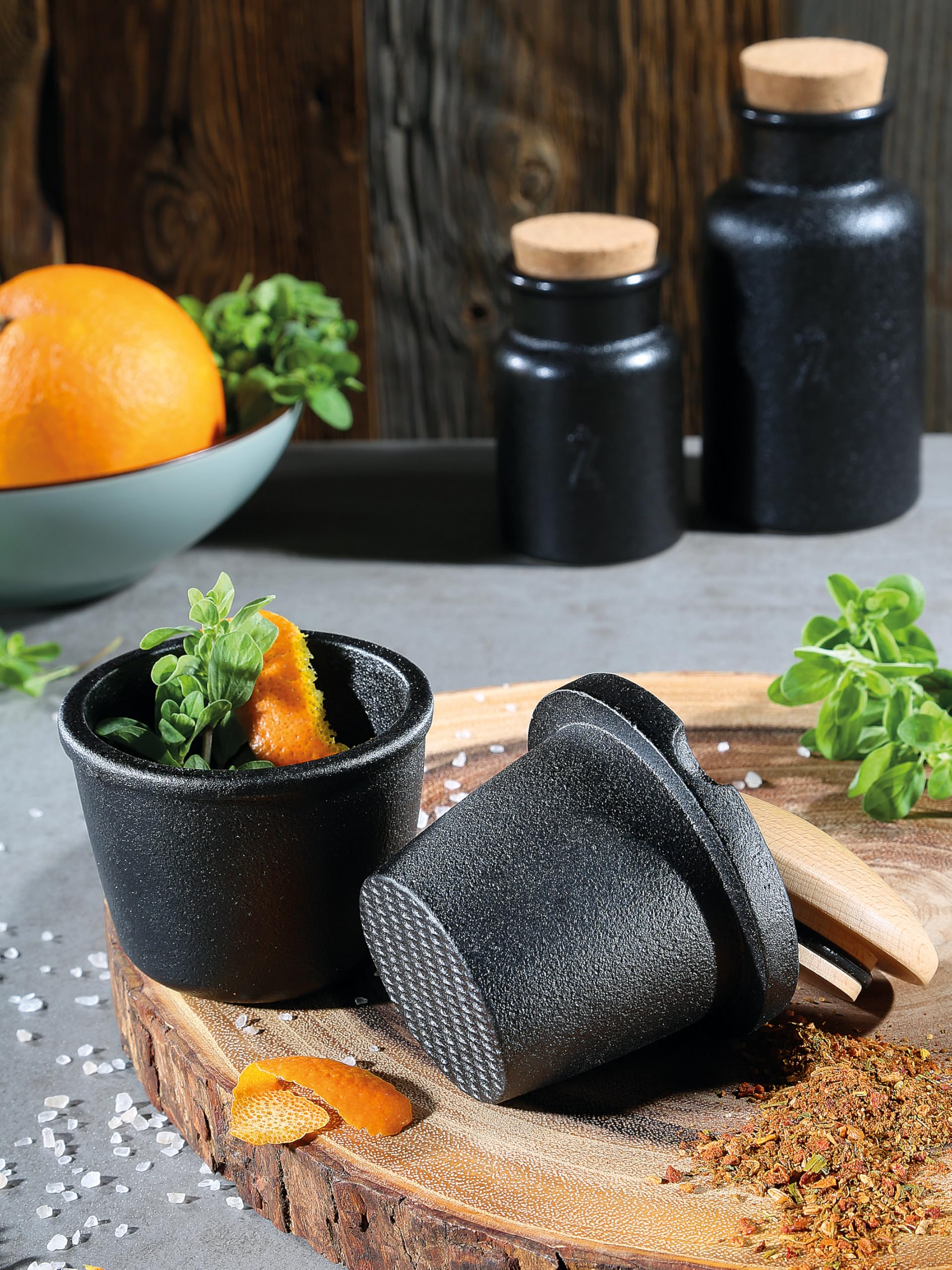 Zassenhaus hand-operated spice grinder in use for fresh pepper or seeds.