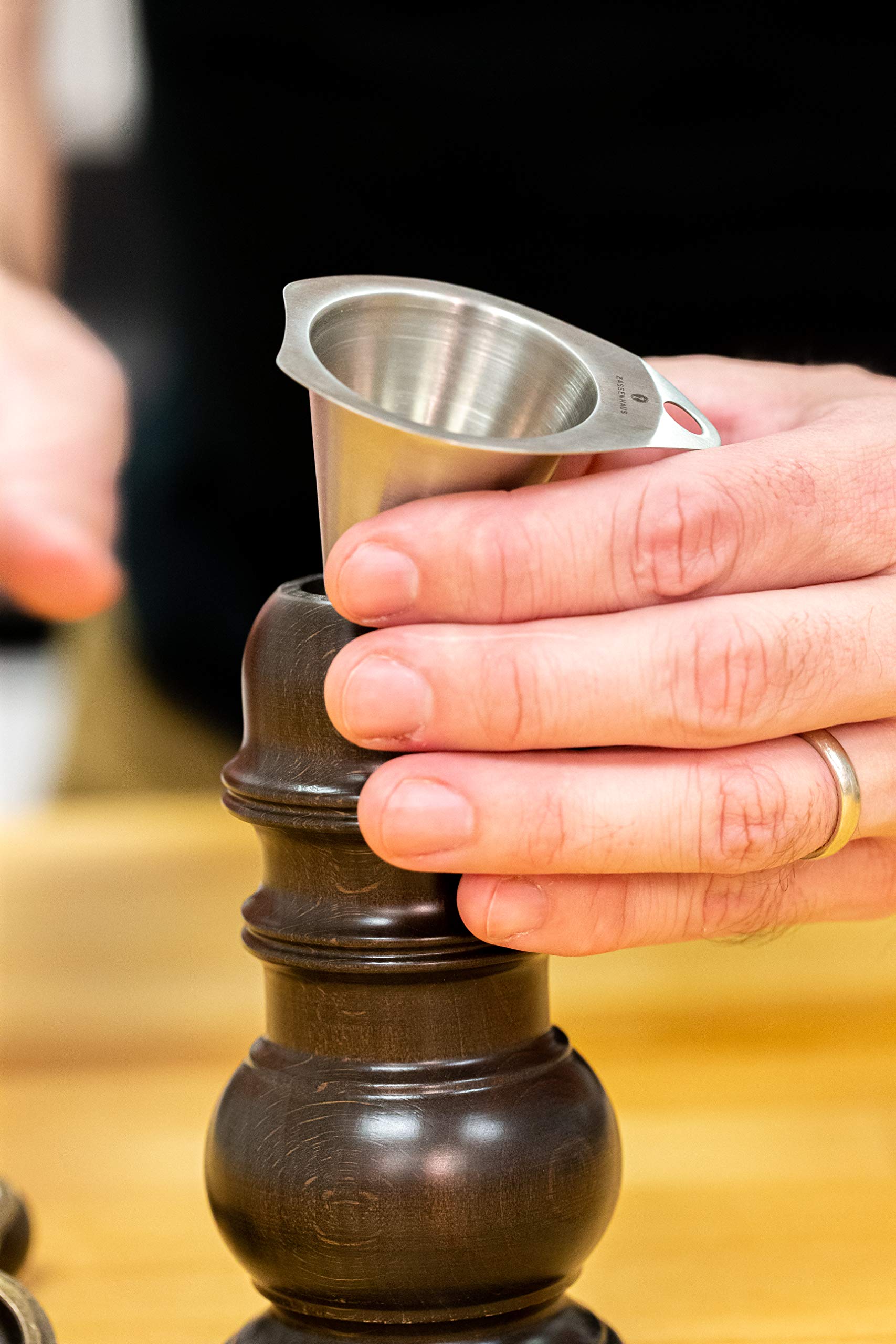 Zassenhaus Speyer crank-handle operation shot highlights ergonomic grinding.