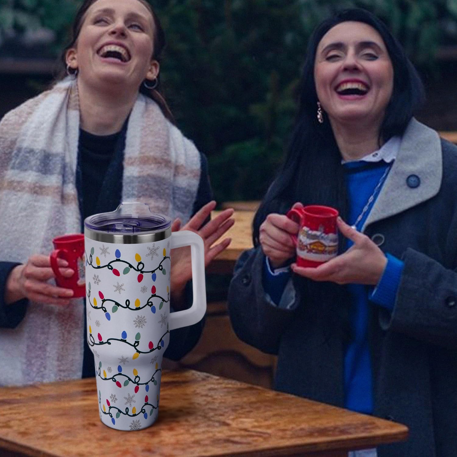 Zbnisiw stainless steel tumbler with festive pattern preserves cold drinks up to 24 hours.