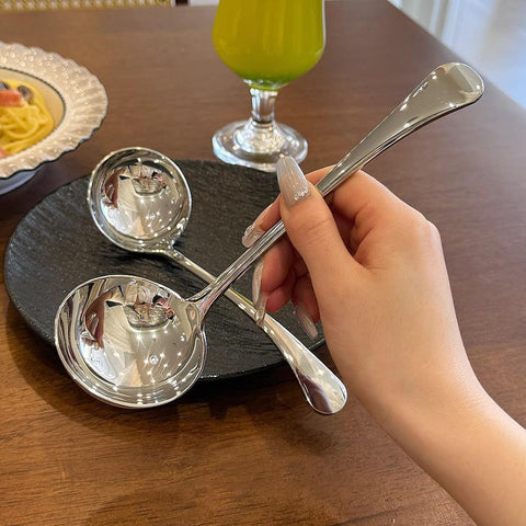 ZDFQly gravy ladle for scooping sauces and gravies with ease.