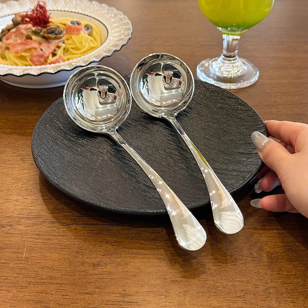 ZDFQly silver-finish ladle adds elegance to any flatware set.