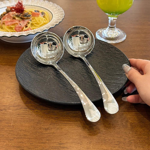 ZDFQly silver-finish ladle adds elegance to any flatware set.