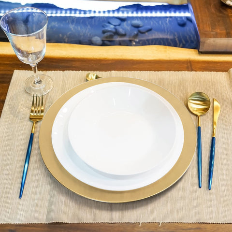 ZEAYEA gold charger plate pairs with ivory china for a chic contrast.