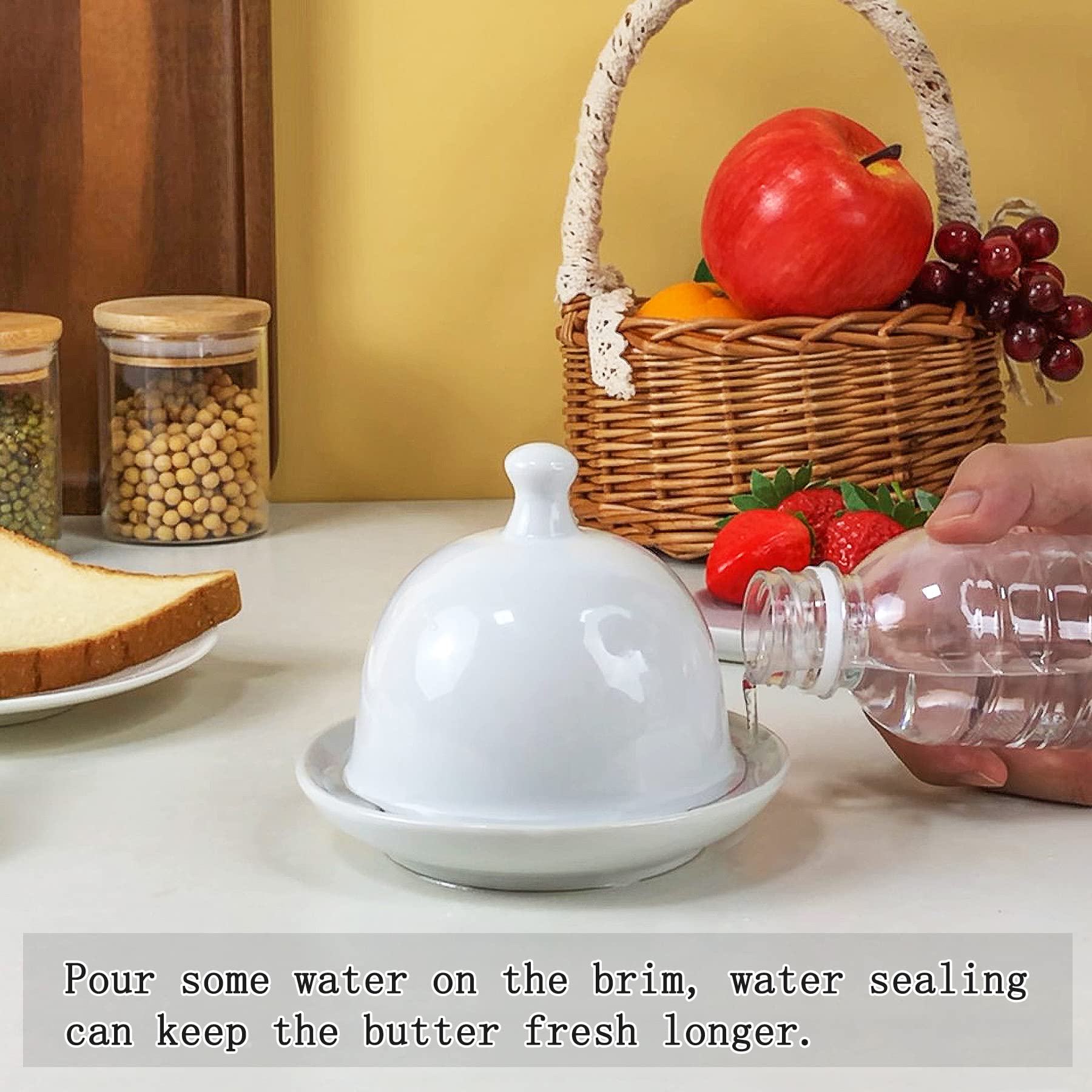 ZEBERBO white bell-shaped ceramic butter dish enhances table settings.