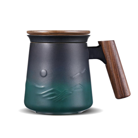 ZENS embossed ceramic tea mug with infuser and lid for rich steeping.
