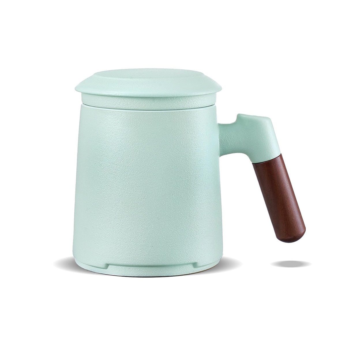 ZENS tea cup with infuser and lid, embossed ceramic for enjoyable loose leaf brewing.