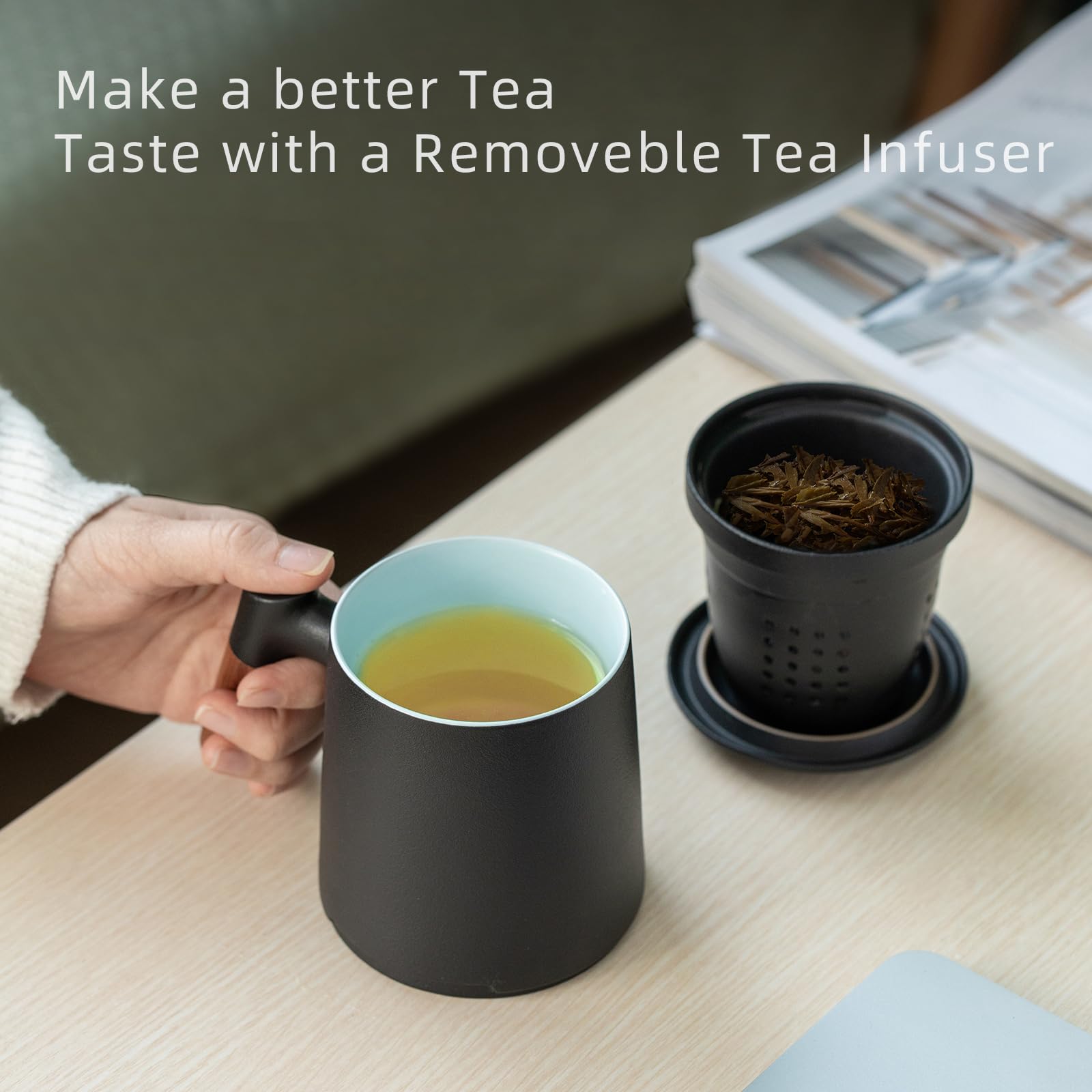 ZENS wood-handle tea cup, ergonomic grip and heat insulation in use