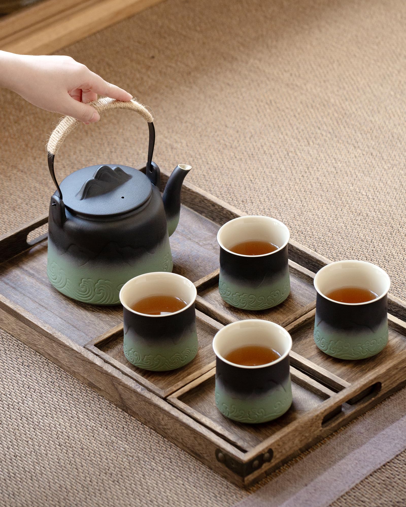 ZENS tea cups pair with the pot for complete set.