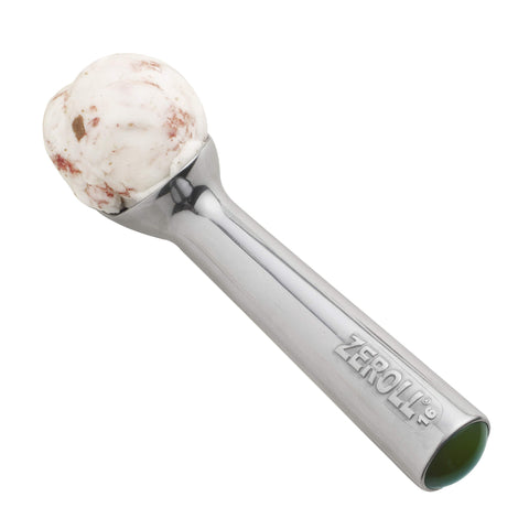 Zeroll easy-release scoop in action creating round, plush scoops