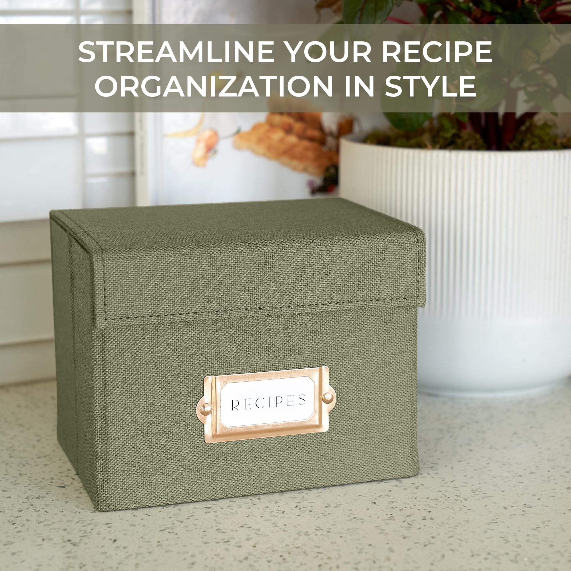 Versatile linen box stores keepsakes, photos, or small items.