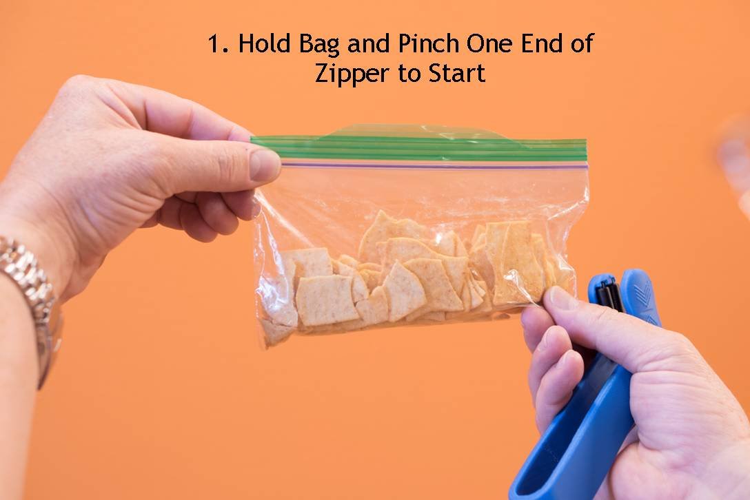 ZipSealer in-use kitchen helper seals bags quickly.
