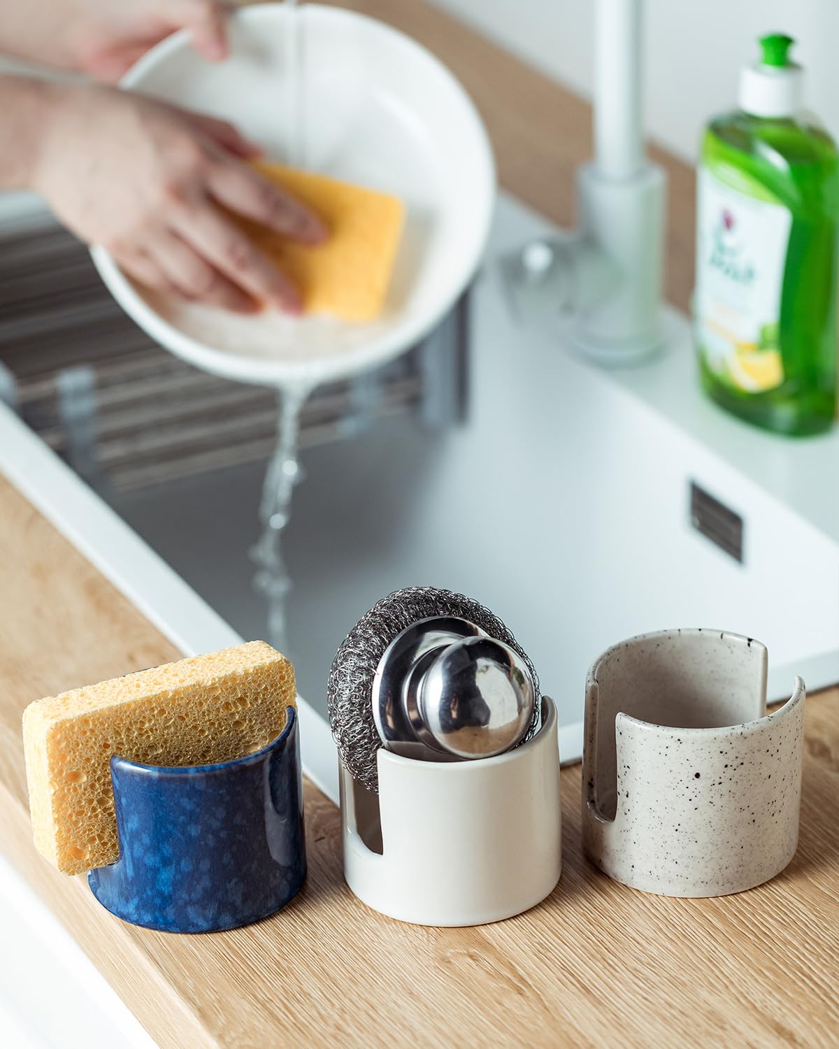 Zoeeker blue sponge holder adds décor to bathroom or kitchen space.