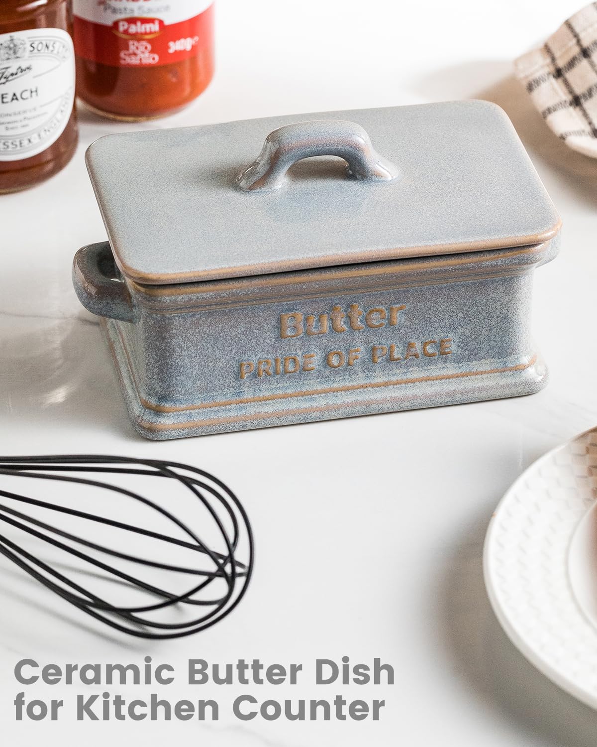 Zoeeker ceramic container with lid in gray preserves texture and adds style.