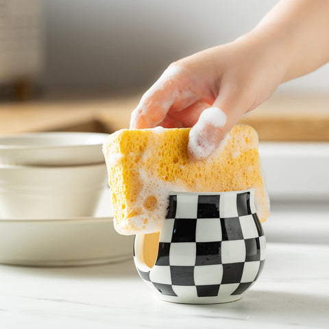 Zoeeker black-white sponge holder with anti-drip base keeps countertops clean.