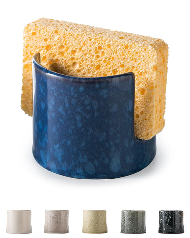 Zoeeker blue ceramic sponge holder sits neatly on the sink edge.