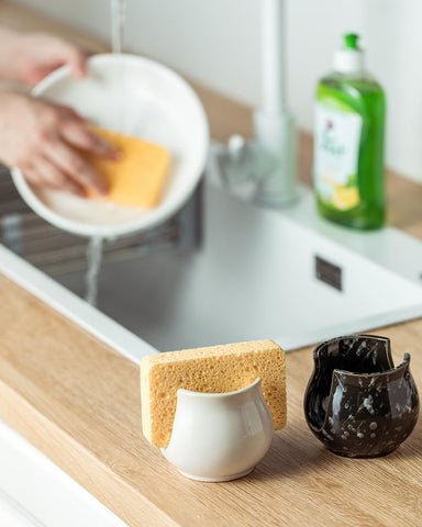 Zoeeker sponge holder with farmhouse white finish helps organize your sink.