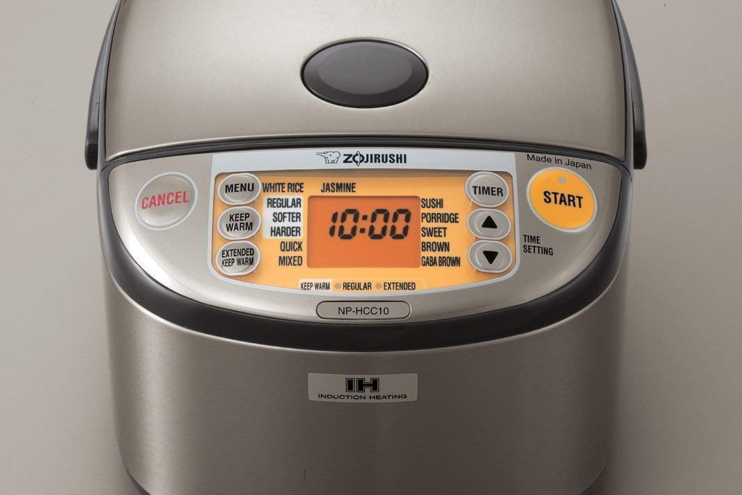 Zojirushi NP-HCC10XH black inner cooking pan promotes even heat and fluffy results.